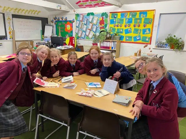 A group of Holmwood House students in a classroom